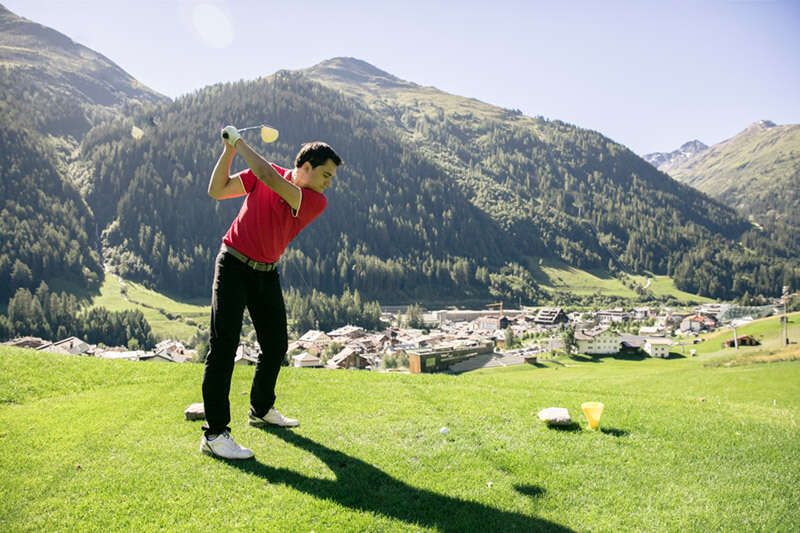 Playing golf in St. Anton am Arlberg
