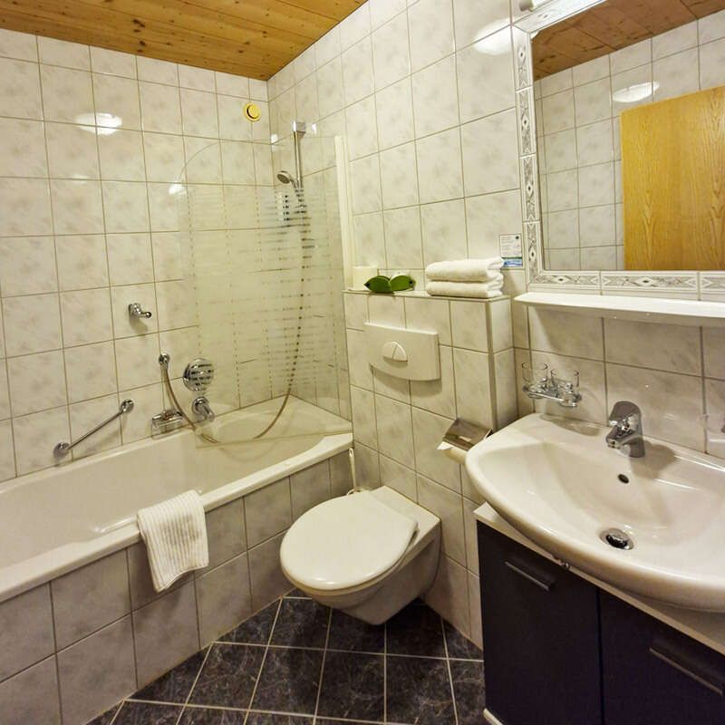 Bathroom with tub and toilet