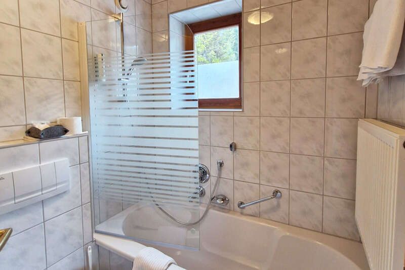 Bathroom with shower and toilet in the Verwall room